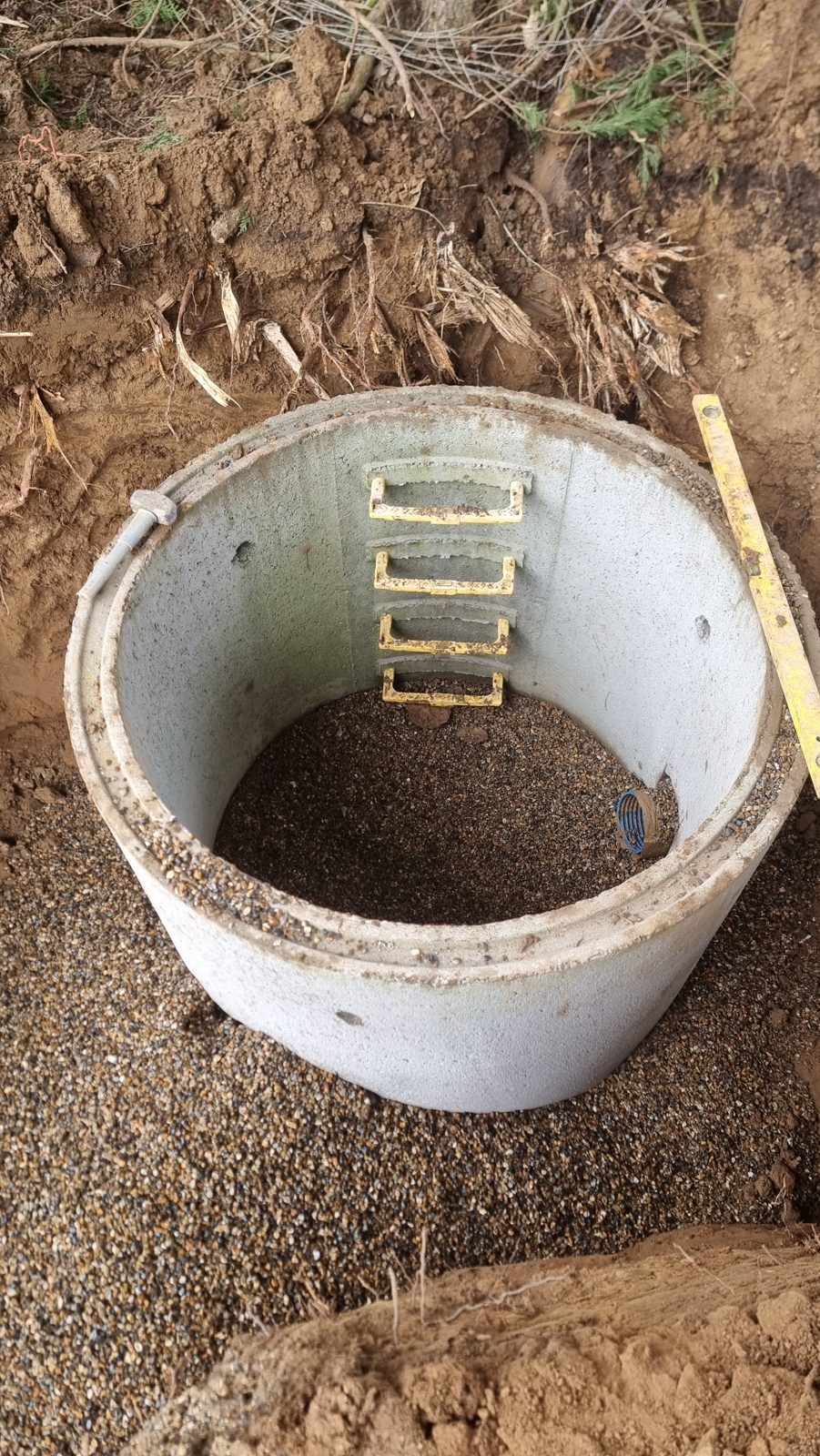 Concrete chamber rings for a drainage manhole.